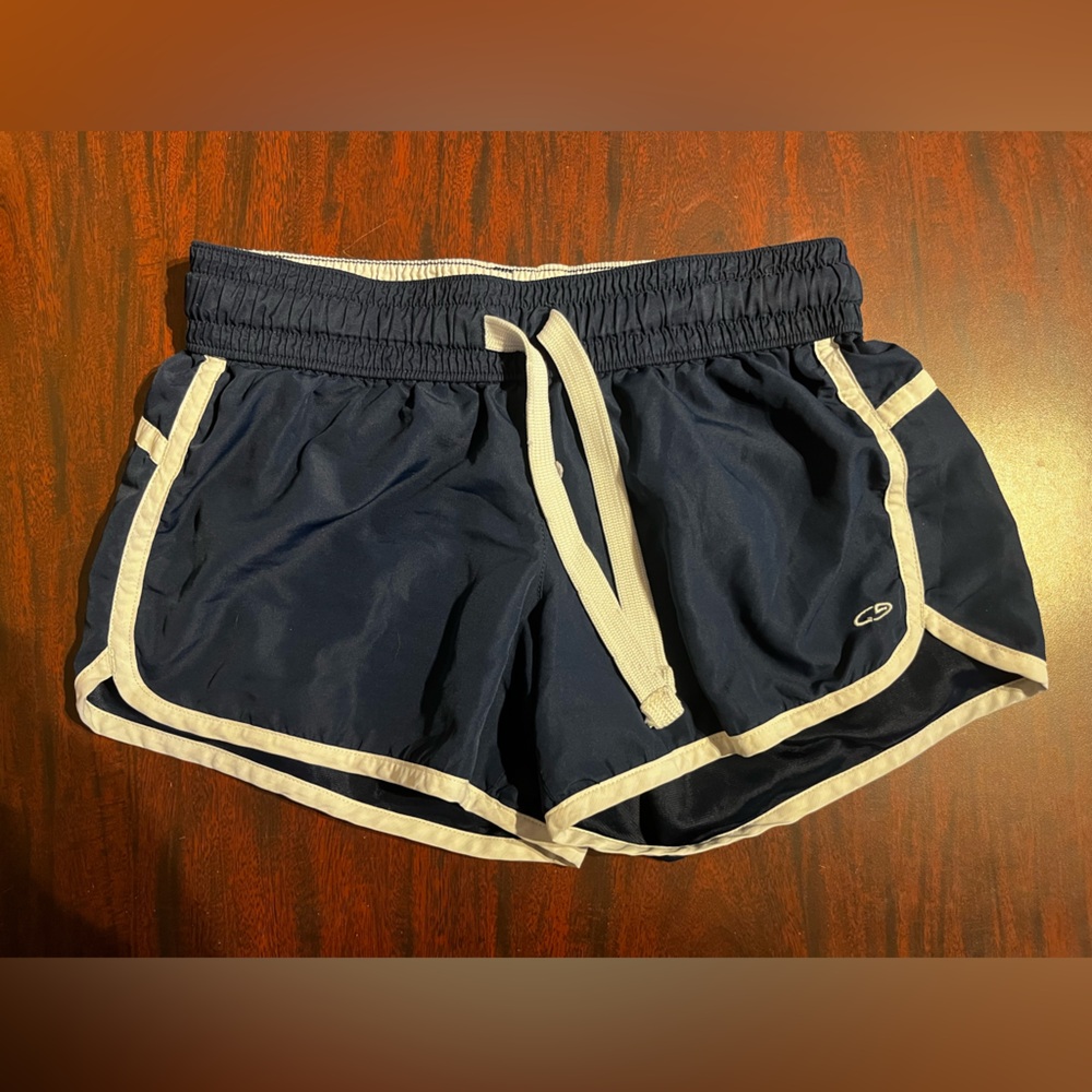 SM women’s Champion running shorts with drawstring waist.